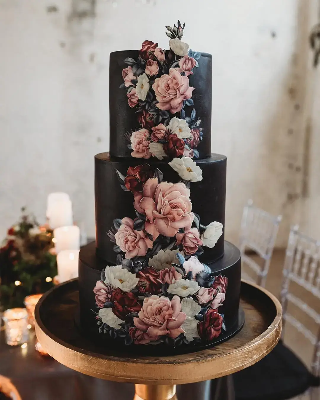 black wedding cake with printed floral design