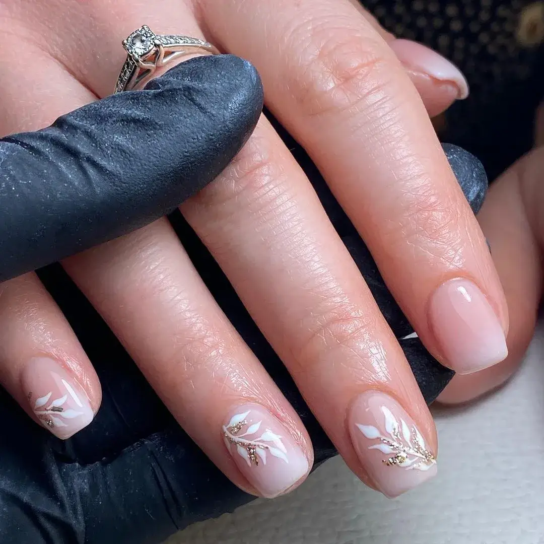 pretty white swirl detail design on nails