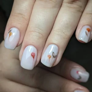 white nails with water coloured florals