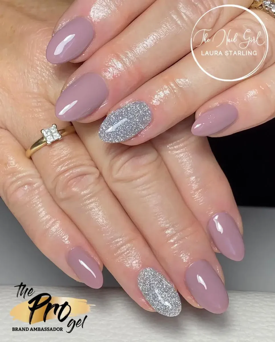 pink nails with on on each hand painted glitter silver