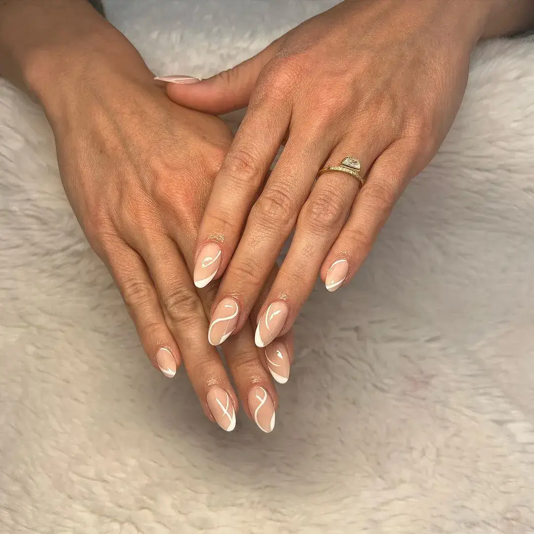 neutral nails with white detailing