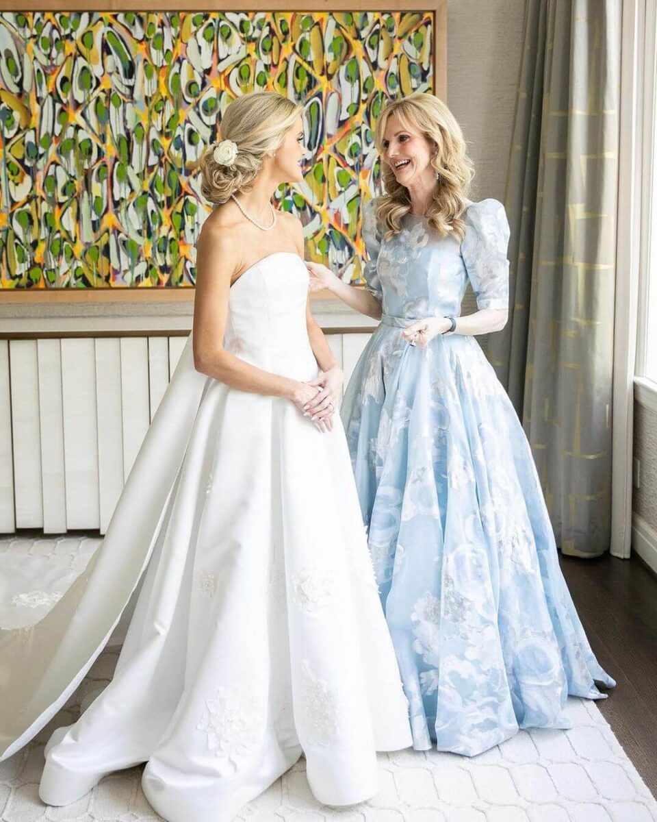 bride with mother in unique blue and white mother of the bride dress