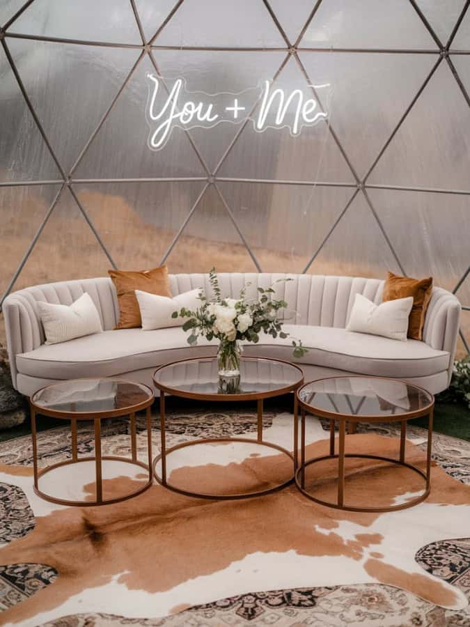 glass igloo cozy lounge set up for a wedding