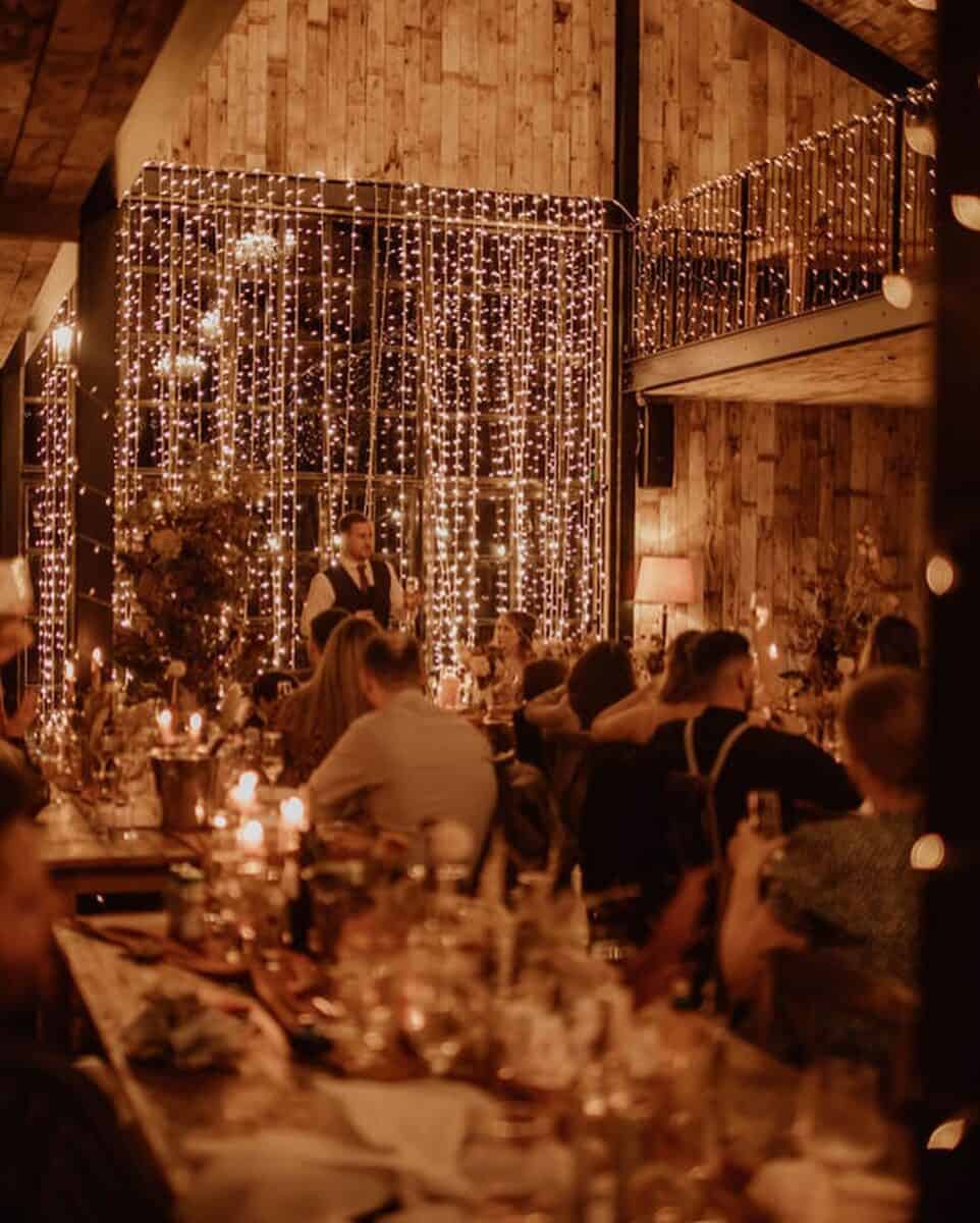 winter wedding reception full of fairy lights