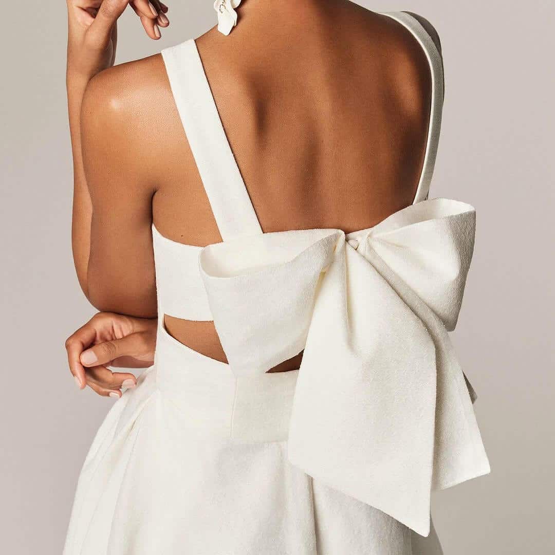 cut out back wedding dress with higher up bow detail
