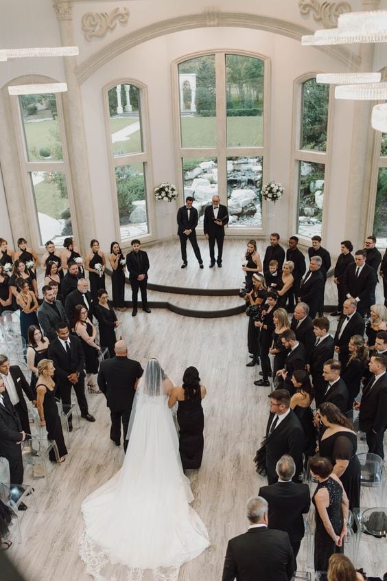 wedding ceremony with guest in all black attire