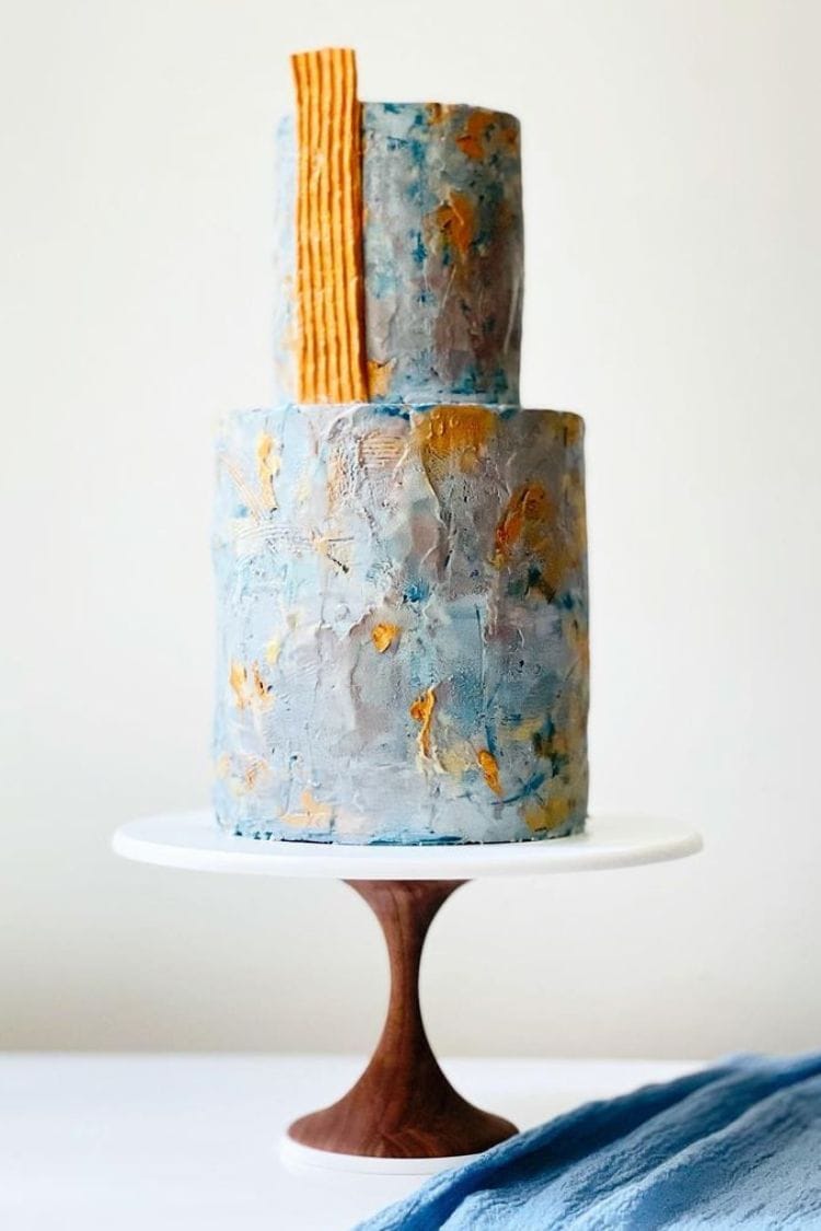 modern textured gold and blue wedding cake