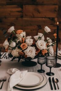 fall wedding table place setting, black, white and terra colors for