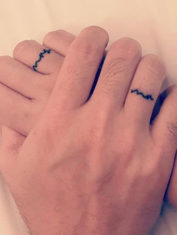 Mrs and Mr wedding ring tattoos 