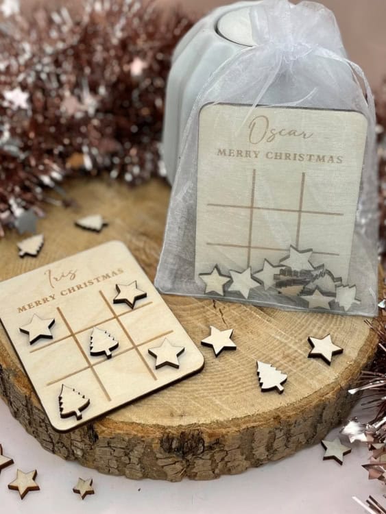 mini wooden tic tac toe game with winter items