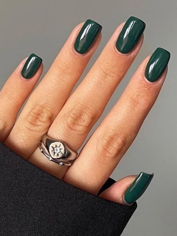 solid, deep green manicure is classic and elegant nails