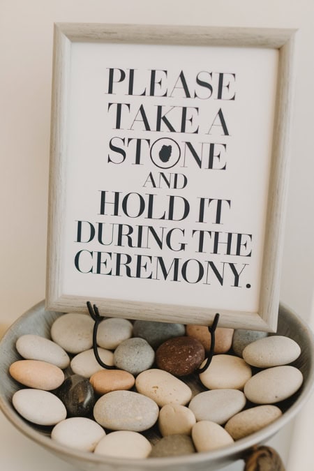 bowl of oathing stones and sign to take one