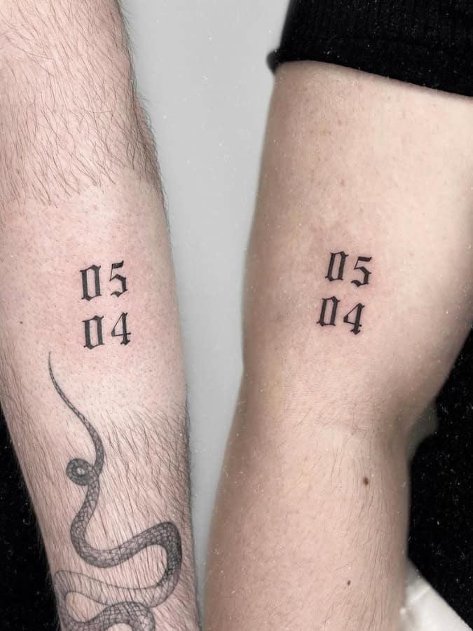 simple stacked date tattoo