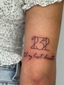 geometric number wedding date tattoo